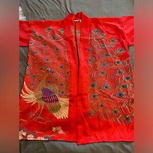 Vibrant Red Kimono with Peacock Design